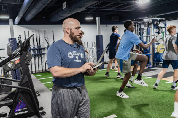 Coach Nick Mascioli eading the workout session